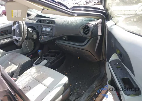 2012 Toyota Prius C One from USA, damaged, VIN JTDKDTB37C1502198